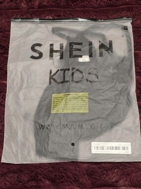 SHEIN KIDS Black Children's Top in Packaged Bag